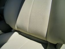Leather car seat after stains were repaired