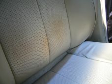 Driver's-seat stains, 2009 Infiniti — before
