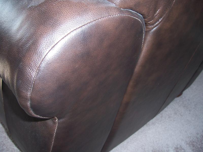 Cat scratches on a sofa — after