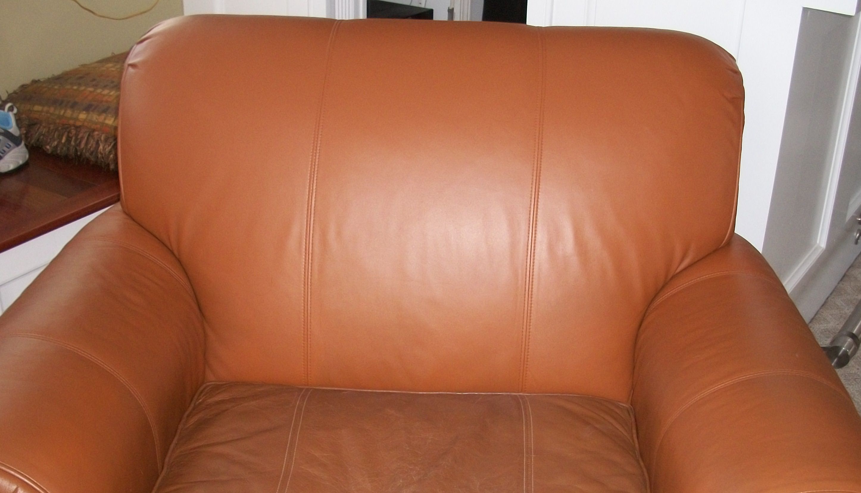 Head-oil stains on a chair — after